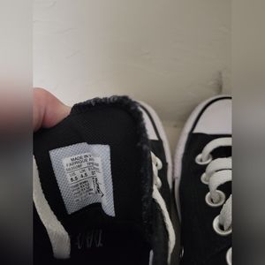 Black and white low tops